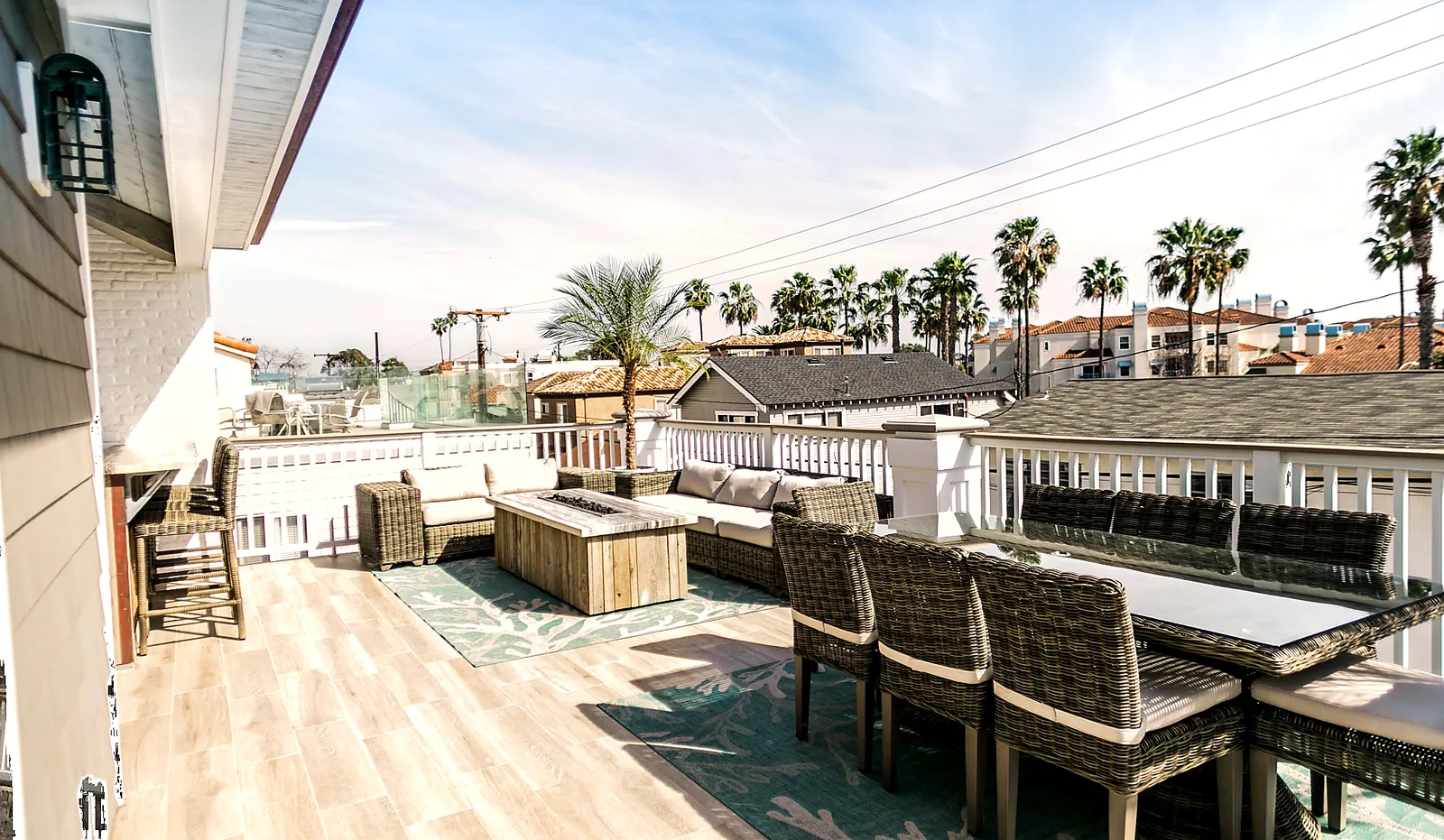 Rooftop back deck with fire pit and dining