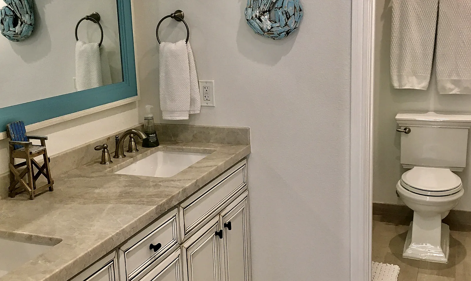 Bedroom 2 bath with double sink and water closet