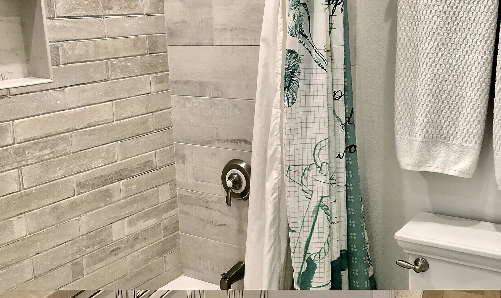 Bedroom 2 shower with custom tile