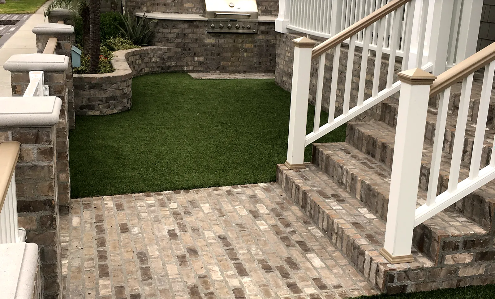 Front yard with stainless steel grill